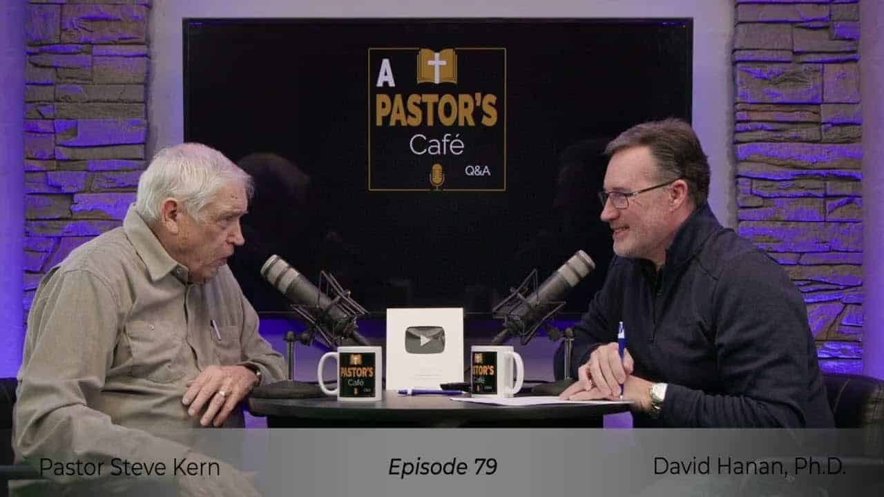 Two pastors engaged in a discussion during Liberty Pastors Training podcast episode.