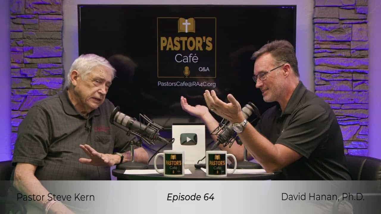 Two pastors engaged in a training session during Liberty Pastors event.