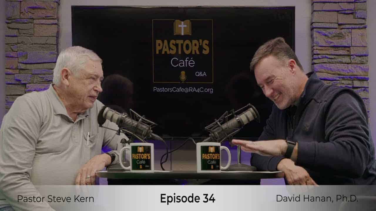 Pastors training session at Liberty Pastors Cafe with two speakers discussing leadership.