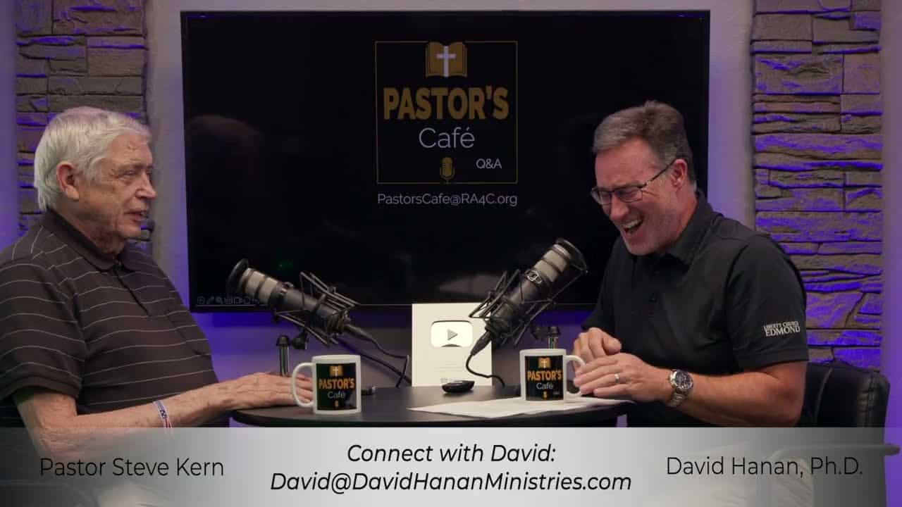 Pastors training session with two pastors discussing ministry strategies.