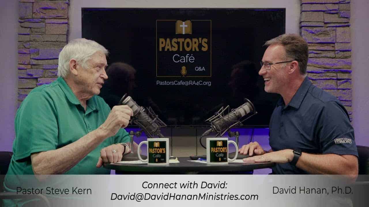 Two pastors engaged in a training session at Liberty Pastors event.