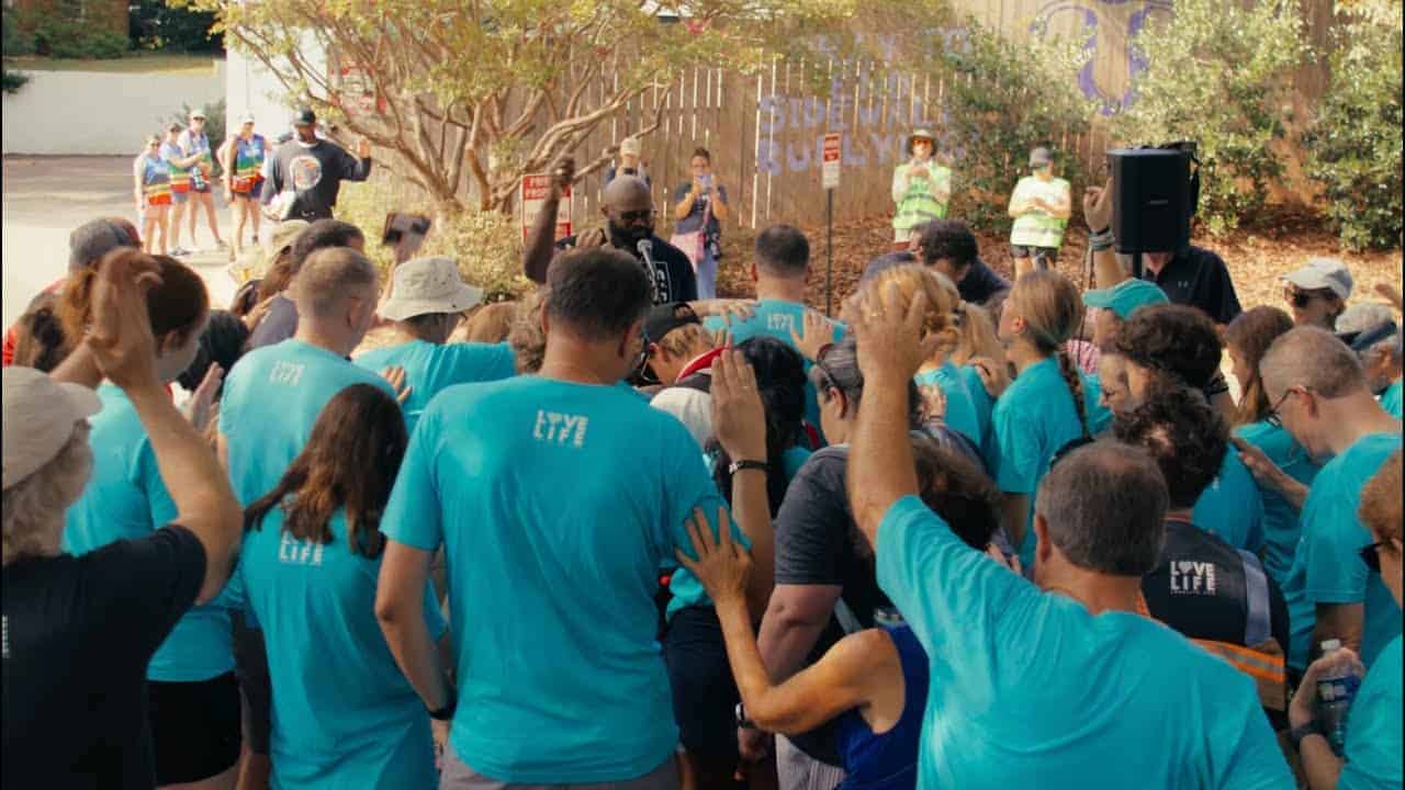 Liberty Pastors Training session with diverse attendees outdoors.