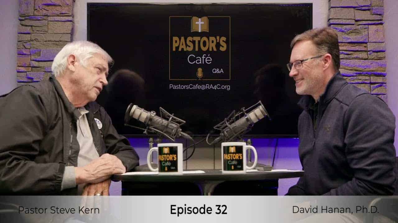 Pastors training session at Liberty Pastors with two speakers discussing faith and leadership.